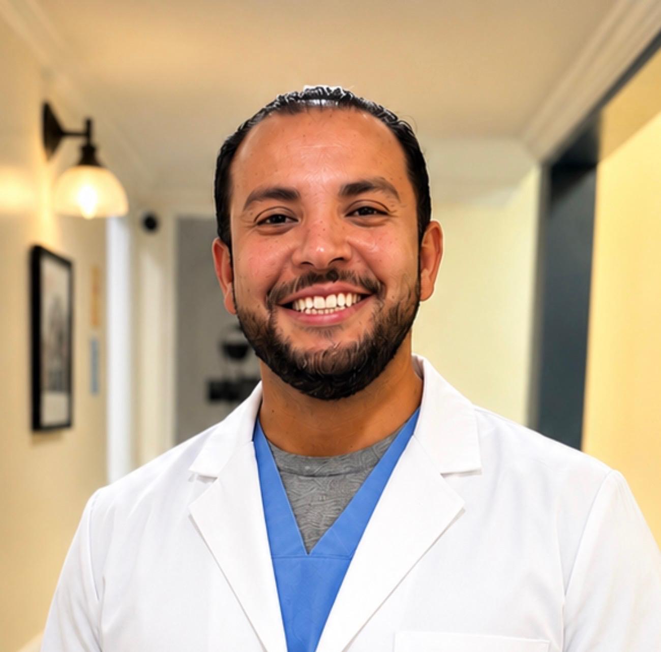 Dr. Tareq Aififi in white coat